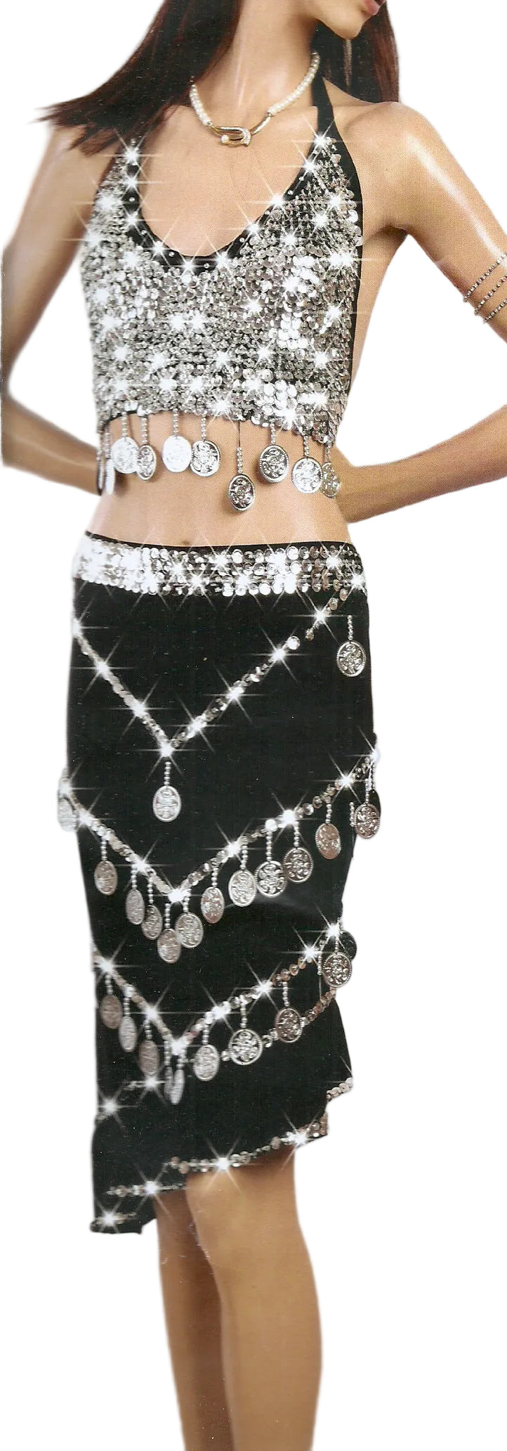 A model wearing a black and white belly dance outfit with embellishments and a beaded necklace.