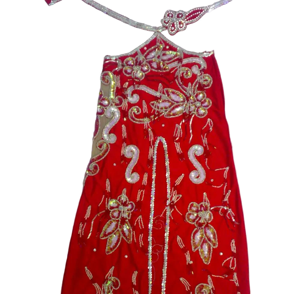 Red dress with gold embroidery on a white background